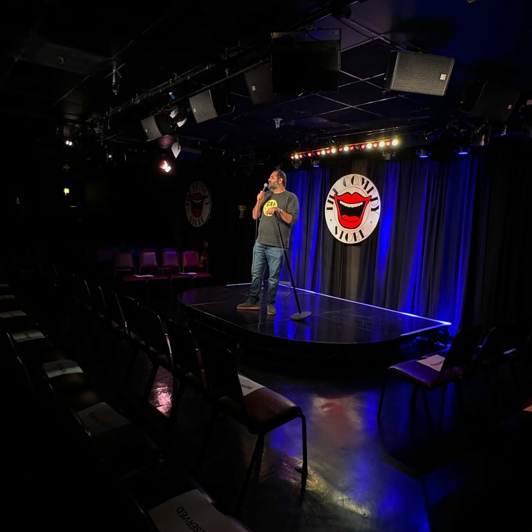Comedian performing on stage close view